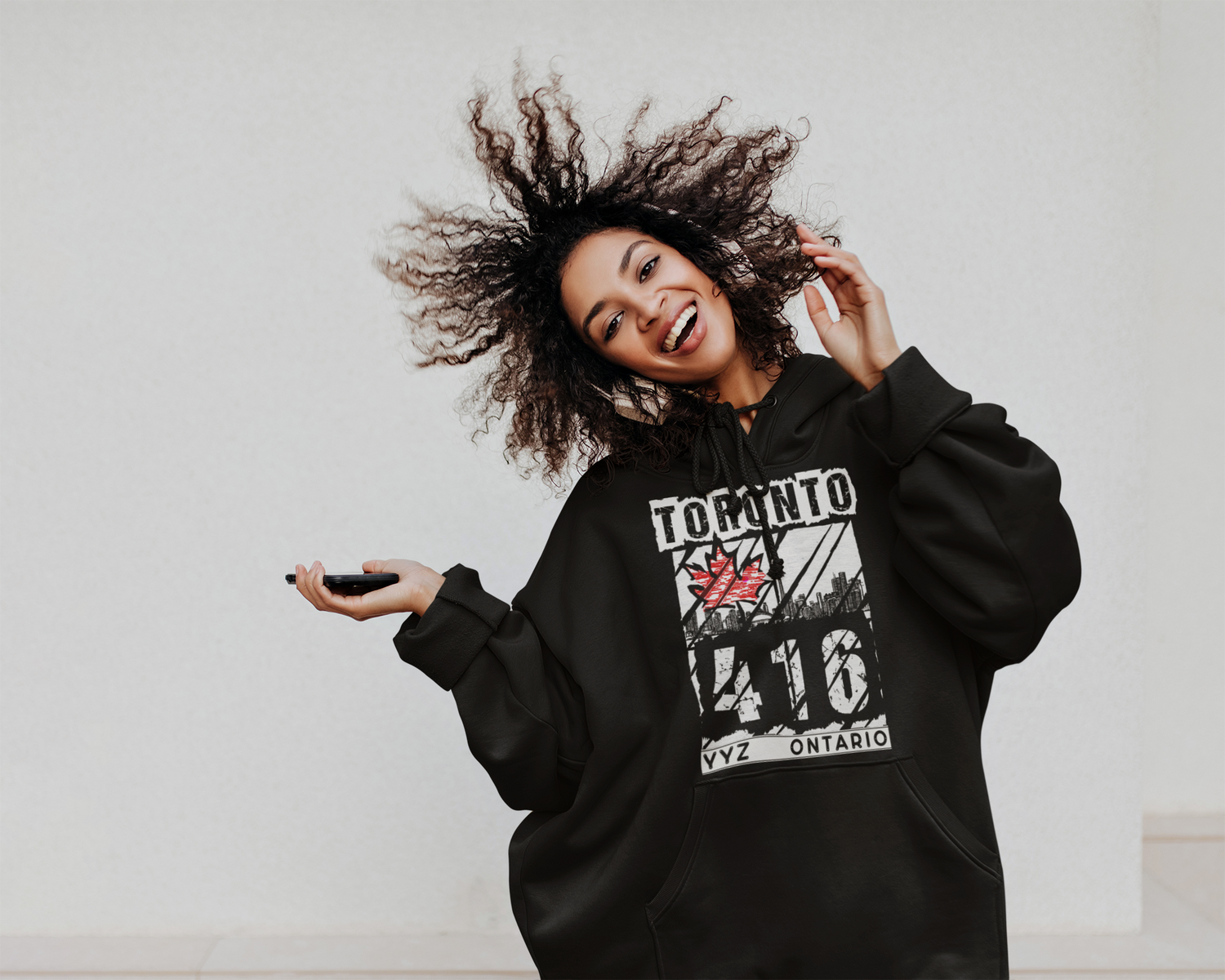 woman dancing with over size sweater